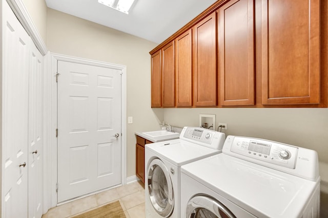 13083 Timber Ct, Palos Heights, IL 60463 - clothes washing area featuring cabinet space, a sink, light tile patterned floors, baseboards, and separate washer and dryer