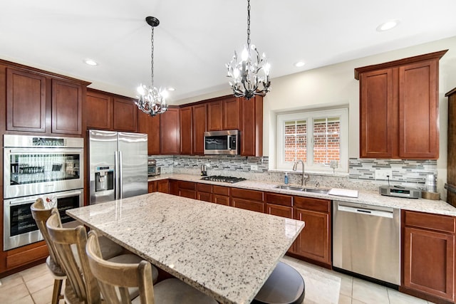 13083 Timber Ct, Palos Heights, IL 60463 - kitchen with a sink, decorative backsplash, a notable chandelier, and stainless steel appliances