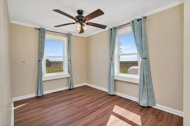23678 N 2700 E Rd, Odell, IL 60460 - spare room with ornamental molding, plenty of natural light, wood finished floors, baseboards, and ceiling fan