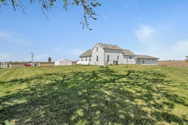 23678 N 2700 E Rd, Odell, IL 60460 - rear view of house with a lawn and central air condition unit