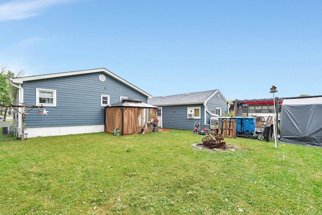 5203 W Court St, Monee, IL 60449 - view of grassy yard with a gazebo and a fire pit