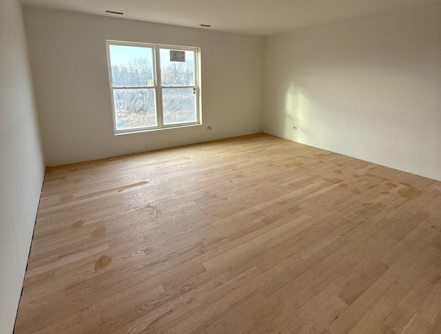 1221 Honey Lake Rd, Lake Zurich, IL 60047 - spare room featuring visible vents and light wood-style flooring