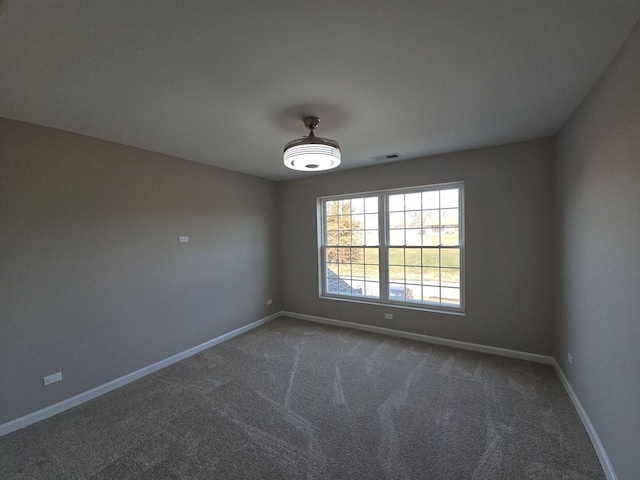 1221 Honey Lake Rd, Lake Zurich, IL 60047 - empty room featuring dark carpet, baseboards, and visible vents