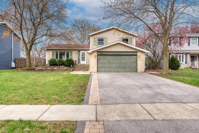view of front of property with a front lawn, fence, and driveway