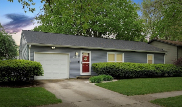 2603 Trafalgar Sq, Champaign, IL 61821 - ranch-style home featuring driveway, a garage, and a front lawn