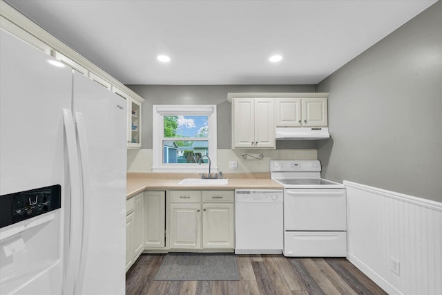 2603 Trafalgar Sq, Champaign, IL 61821 - kitchen with white appliances, under cabinet range hood, a sink, white cabinetry, and recessed lighting