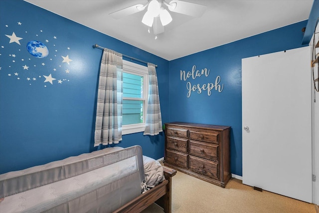 2603 Trafalgar Sq, Champaign, IL 61821 - bedroom with carpet, a ceiling fan, and baseboards