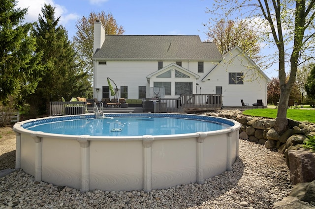 outdoor pool with a deck