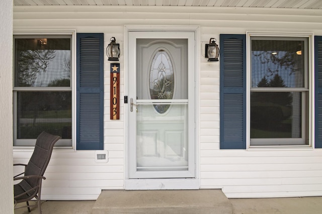 entrance to property with a porch