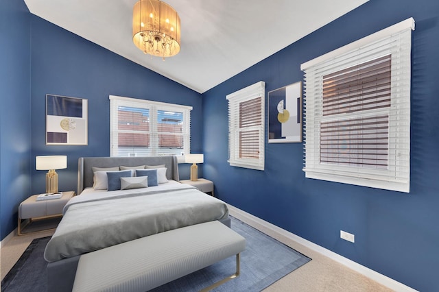 1800 W Melrose St, Chicago, IL 60657 - bedroom with vaulted ceiling, carpet, baseboards, and a chandelier