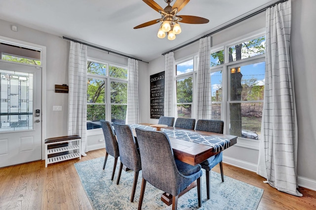 1800 W Melrose St, Chicago, IL 60657 - dining area featuring ceiling fan, wood finished floors, and baseboards