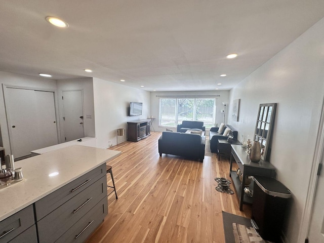 9911 Kedvale Ave, Skokie, IL 60076 - living room with recessed lighting and light wood-type flooring