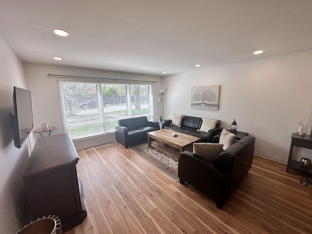 9911 Kedvale Ave, Skokie, IL 60076 - living room with recessed lighting and wood finished floors