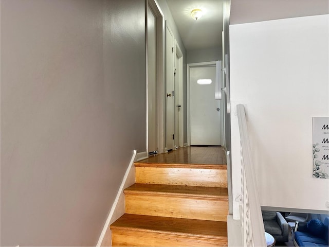 9911 Kedvale Ave, Skokie, IL 60076 - stairway featuring baseboards and wood finished floors
