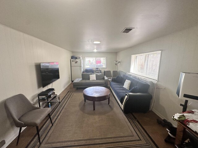 9911 Kedvale Ave, Skokie, IL 60076 - living room featuring baseboards and visible vents