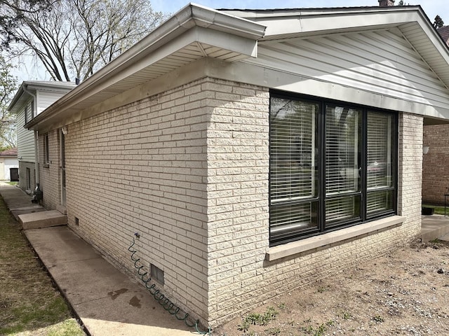 9911 Kedvale Ave, Skokie, IL 60076 - view of side of home with crawl space and brick siding