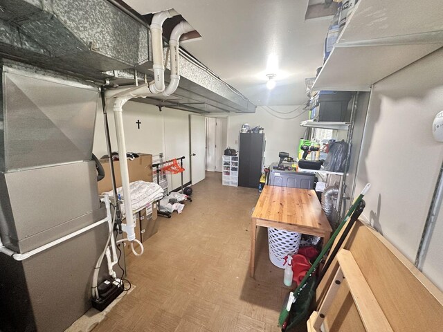 9911 Kedvale Ave, Skokie, IL 60076 - finished below grade area featuring tile patterned floors and heating unit