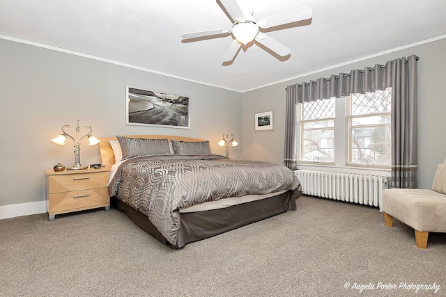 bedroom with a ceiling fan, crown molding, carpet floors, baseboards, and radiator heating unit