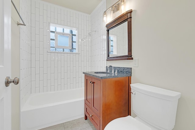 full bath featuring vanity, tile patterned floors, shower / bathtub combination, and toilet