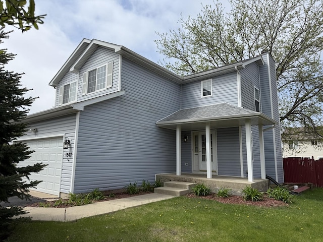 traditional home with covered porch, a chimney, fence, a front lawn, and an attached garage