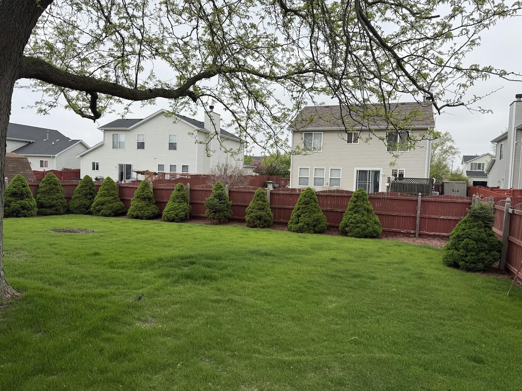 view of yard with fence