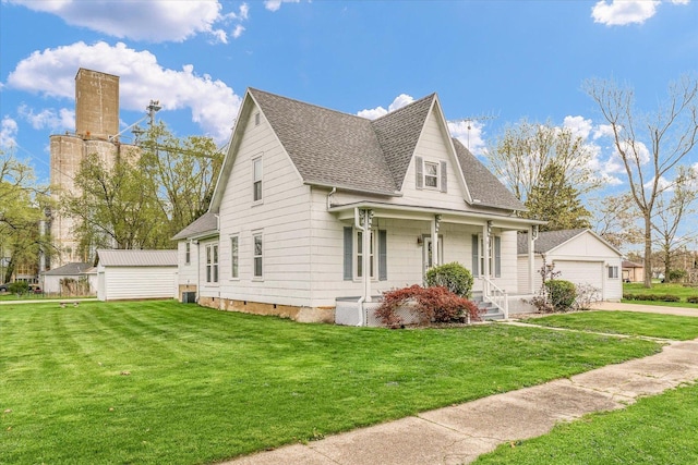 view of home's exterior featuring roof with shingles, an outdoor structure, a porch, and crawl space