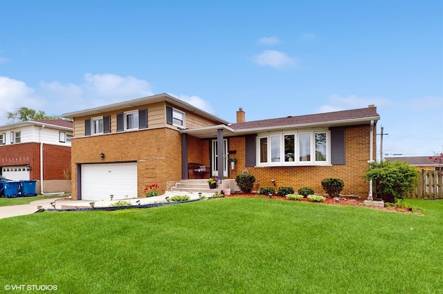 tri-level home with brick siding, driveway, a garage, and a chimney