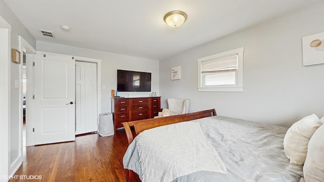 bedroom with wood finished floors