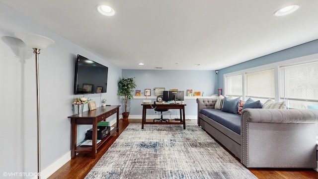 living room featuring wood finished floors, recessed lighting, an office area, and baseboards