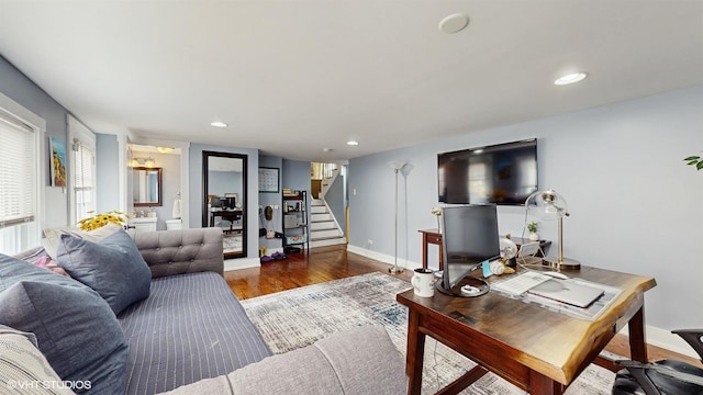 living room featuring stairs, wood finished floors, recessed lighting, an office area, and baseboards
