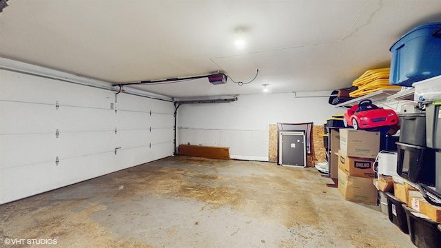 garage featuring a garage door opener