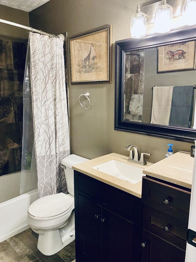 bathroom with vanity, shower / bath combination with curtain, and toilet