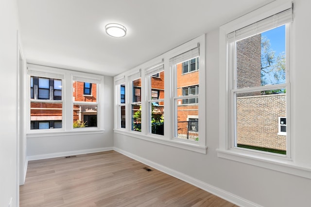 view of unfurnished sunroom