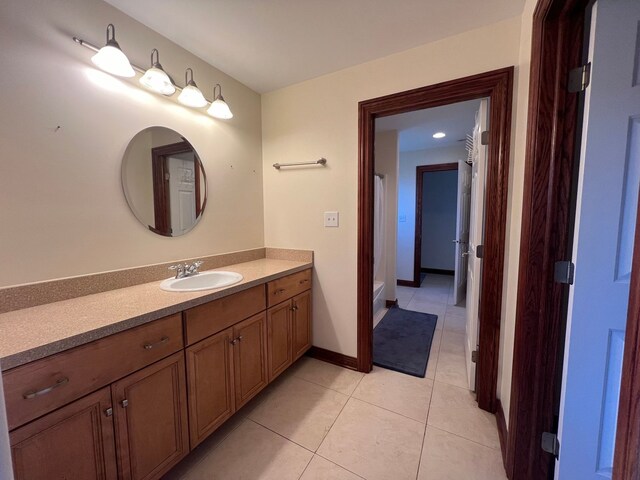 14312 Twin Creek Ct, Homer Glen, IL 60491 - bathroom featuring vanity, tile patterned flooring, and baseboards