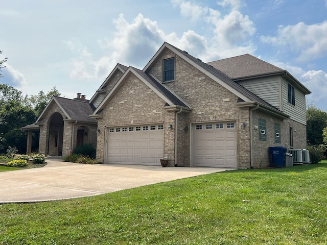 14312 Twin Creek Ct, Homer Glen, IL 60491 - view of front facade featuring brick siding, a garage, a front yard, and concrete driveway