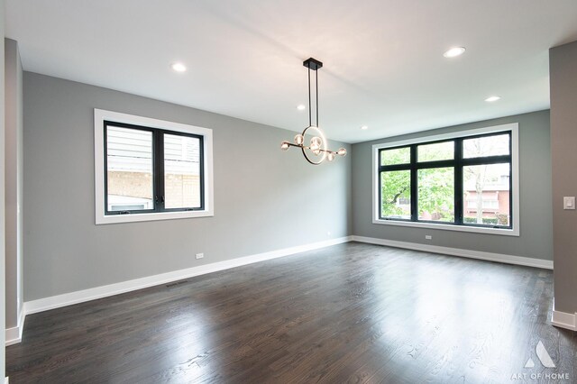6908 26th St, Berwyn, IL 60402 - empty room with recessed lighting, a notable chandelier, and dark wood finished floors