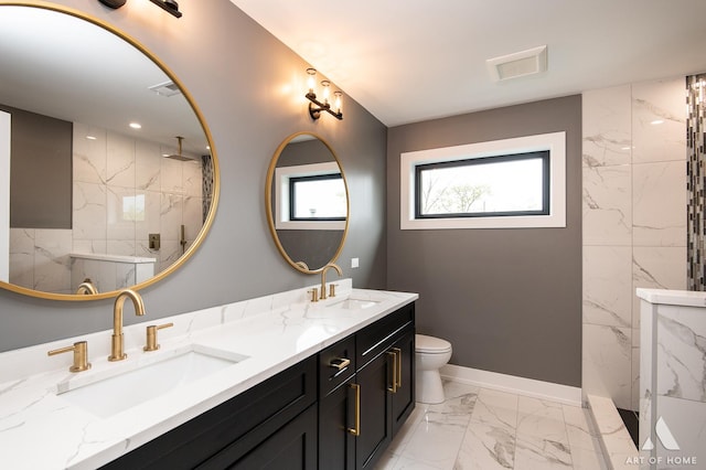 6908 26th St, Berwyn, IL 60402 - full bath with a marble finish shower, marble finish floor, toilet, and a sink