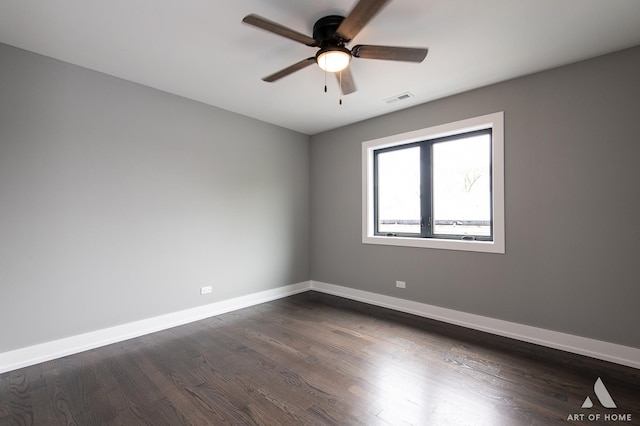 6908 26th St, Berwyn, IL 60402 - empty room with baseboards, a ceiling fan, visible vents, and dark wood finished floors