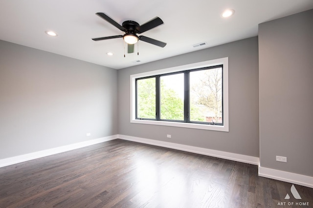 6908 26th St, Berwyn, IL 60402 - spare room with ceiling fan, recessed lighting, dark wood finished floors, and visible vents