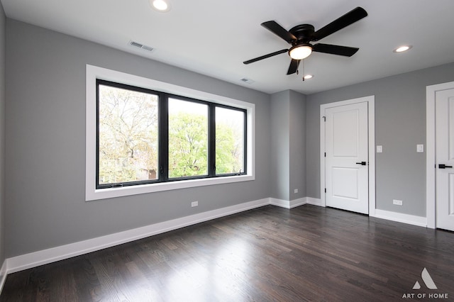 6908 26th St, Berwyn, IL 60402 - unfurnished room with a ceiling fan, dark wood finished floors, visible vents, baseboards, and recessed lighting