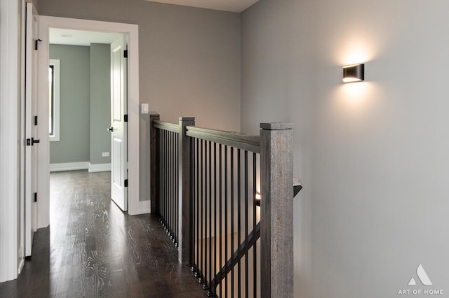 6908 26th St, Berwyn, IL 60402 - hallway with baseboards, an upstairs landing, and wood finished floors