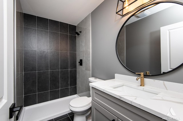 6908 26th St, Berwyn, IL 60402 - full bath with vanity, toilet, visible vents, and tiled shower