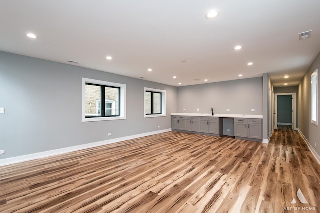 6908 26th St, Berwyn, IL 60402 - interior space with light wood-type flooring, visible vents, baseboards, and recessed lighting