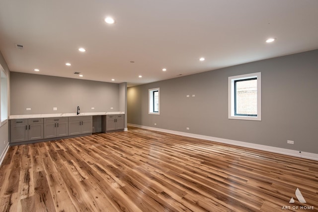6908 26th St, Berwyn, IL 60402 - interior space with a sink, visible vents, recessed lighting, baseboards, and light wood-style floors