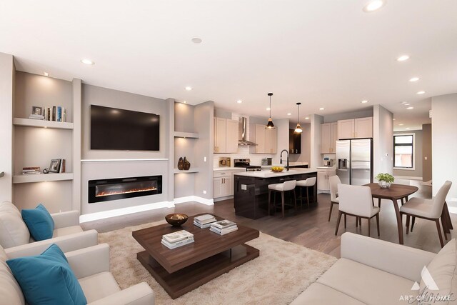 6908 26th St, Berwyn, IL 60402 - living area with dark wood-style flooring, recessed lighting, a glass covered fireplace, and built in shelves