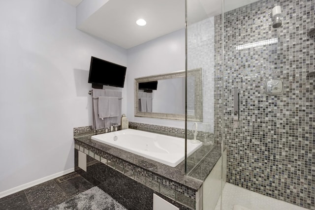 1455 S Halsted St, Chicago, IL 60607 - full bathroom with baseboards, tiled shower, and a bath