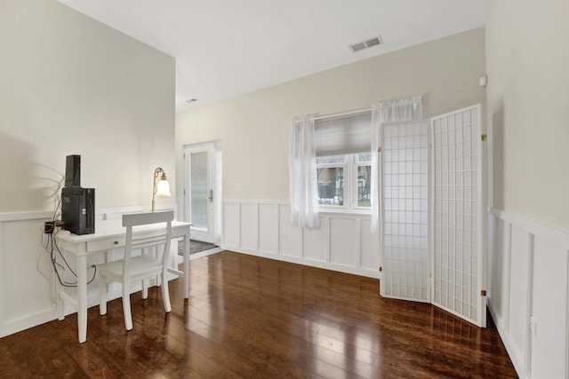 1455 S Halsted St, Chicago, IL 60607 - dining room featuring a decorative wall, wainscoting, wood finished floors, and visible vents