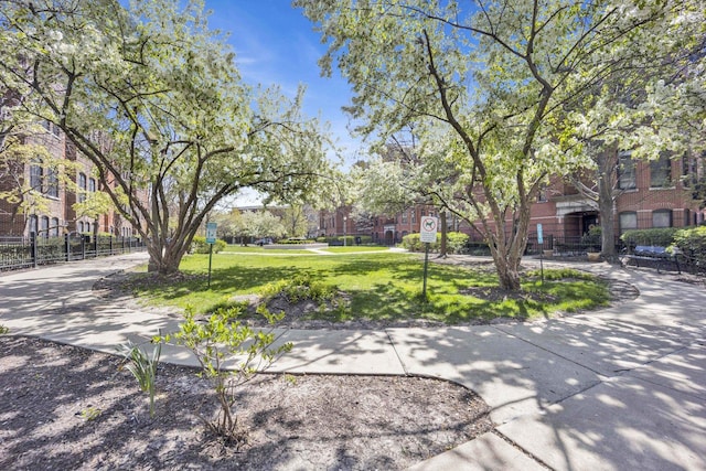 1455 S Halsted St, Chicago, IL 60607 - view of community featuring fence and a yard