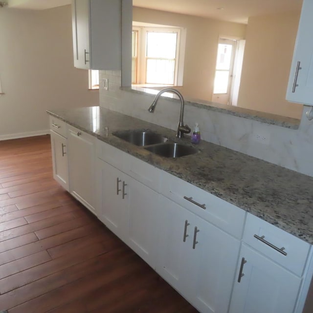 457 N Cambridge Dr Unit 457, Palatine, IL 60067 - kitchen with a sink, dark wood finished floors, and backsplash