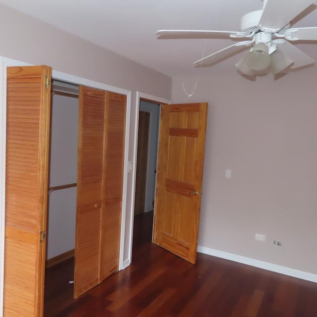 457 N Cambridge Dr Unit 457, Palatine, IL 60067 - unfurnished bedroom featuring baseboards, a ceiling fan, wood finished floors, and a closet